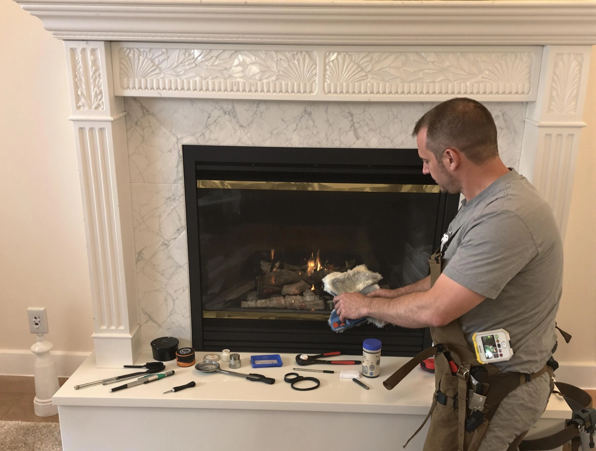 Redan Chimney Sweep performing fireplace maintenance in Redan, GA